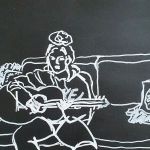 Luka speelt gitaar